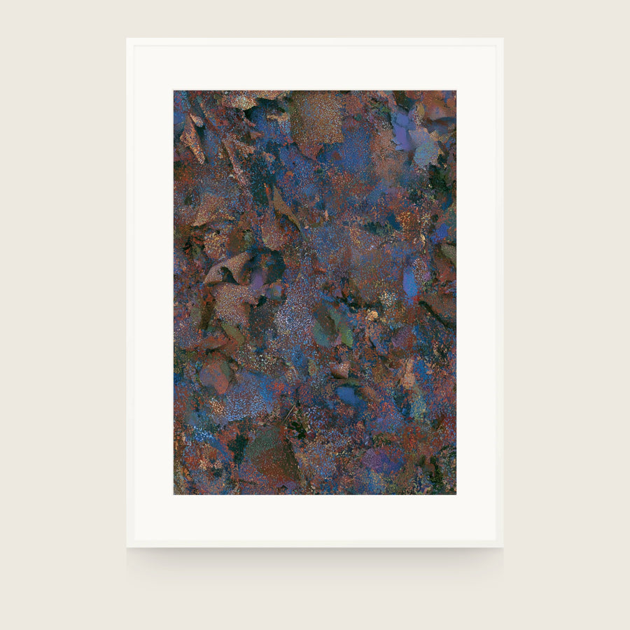 Patina IX — Strata. Dense blue and rust flecking with darker overlapping shapes beneath. Shown framed. Frames and mounts are not included.