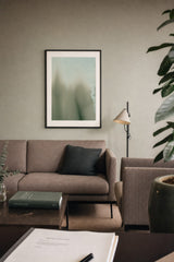 Ceramics XII — Blur. Pale mint sheet, grainy at the top, with soft blurred olive shapes rising from the lower edge. Hung on a wall in a room. Shown framed. Frames and mounts are not included.