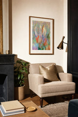 Botanics VIII — Arch. Pale speckled colour in cream, lilac and mint, with two faint arched forms above and orange marks below. Hung on a wall in a room. Shown framed. Frames and mounts are not included.
