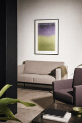 Ceramics XVIII — Divide. Dark purple in the upper half meeting yellow-green in the lower half, with a short transition between them. Hung on a wall in a room. Shown framed. Frames and mounts are not included.