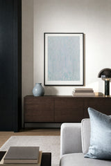 Glacier V — Veil. Almost white field of fine vertical flecks in mint, grey and faint lilac, a little denser in two columns either side of the centre. Hung on a wall in a room. Shown framed. Frames and mounts are not included.