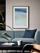 Ceramics V — Sediment. Navy at the top dissolving into pale grey-green speckle, thinning from a dense mesh into separate flecks towards the bottom. Hung on a wall in a room. Shown framed. Frames and mounts are not included.