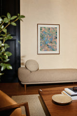 Botanics X — Coral. Peach and aqua broken into small fragments, with dark green masses at the edges and blue through the centre. Hung on a wall in a room. Shown framed. Frames and mounts are not included.
