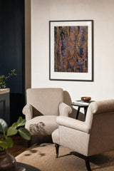 Patina IV — Furrow. Vertical channels of orange and tan over blue-grey, built from small tile-like marks. Hung on a wall in a room. Shown framed. Frames and mounts are not included.