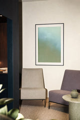 Ceramics XIV — Pool. Soft gradient from olive green at the base to pale blue-grey at the top, with fine pitting across the lower part. Hung on a wall in a room. Shown framed. Frames and mounts are not included.